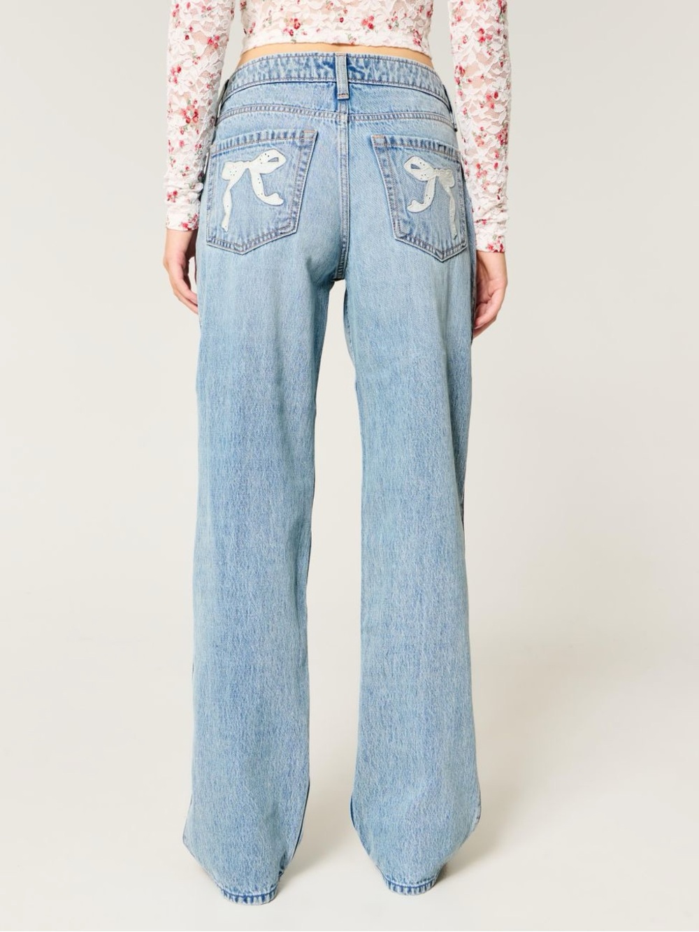 Hollister Low Rise Eyelet Bow Loose Jeans in Blue